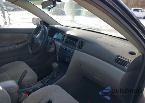 2003 Toyota Corolla Le z USA, uszkodzony, nr VIN JTDBR38E630051006